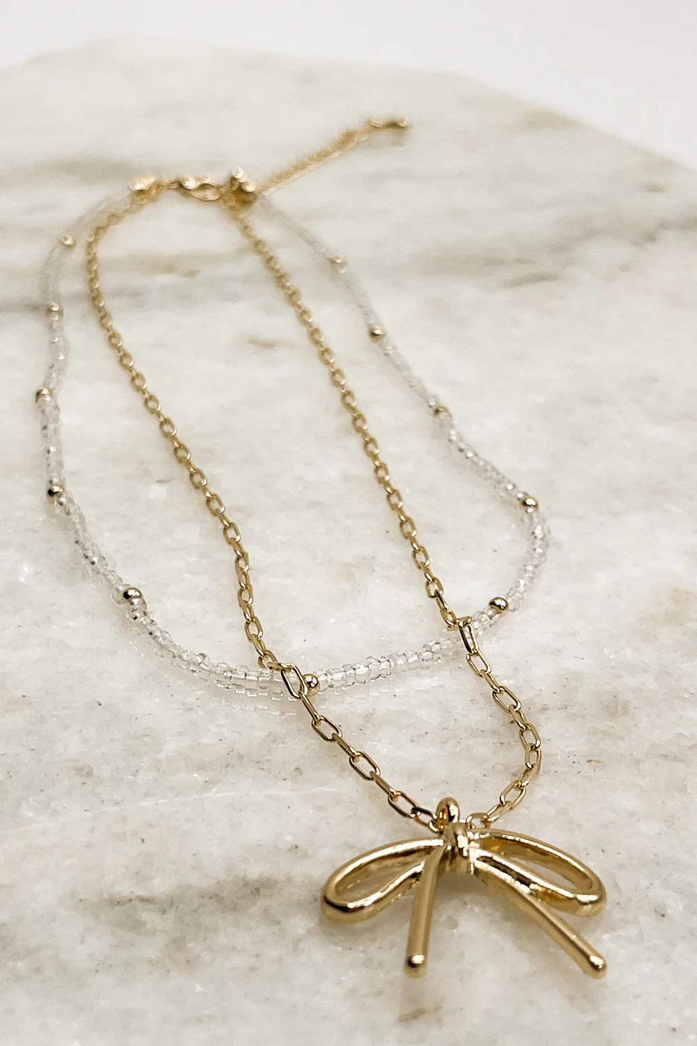 April Bow Pearl and Gold Necklace - Image 2