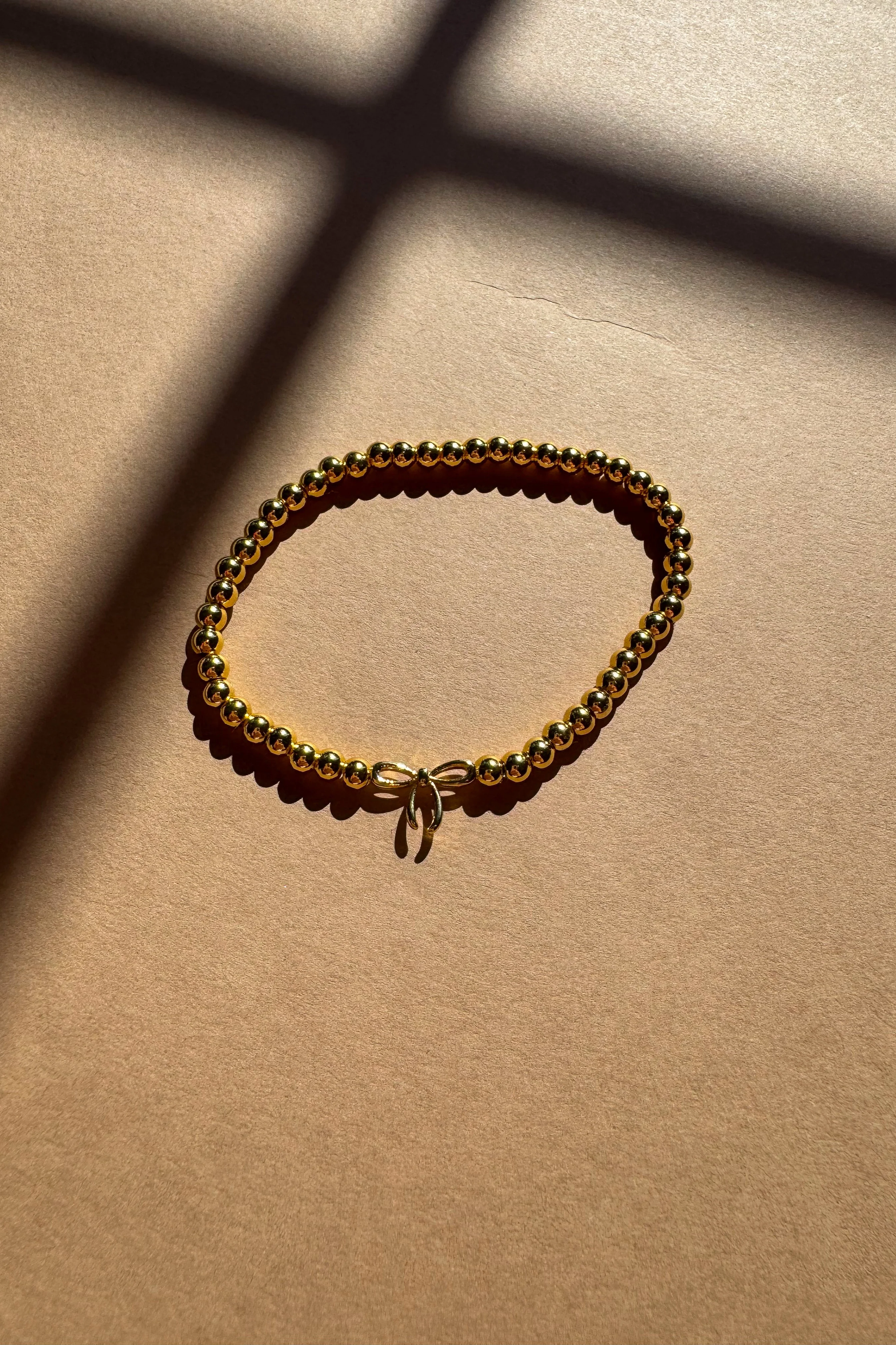 Carmen Gold Beaded Bow Bracelet - Image 2