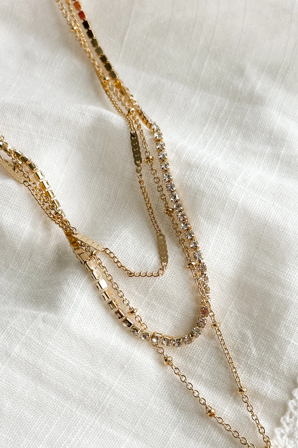 Celeste Gold Triple Layer Chain Heart Necklace - Image 3