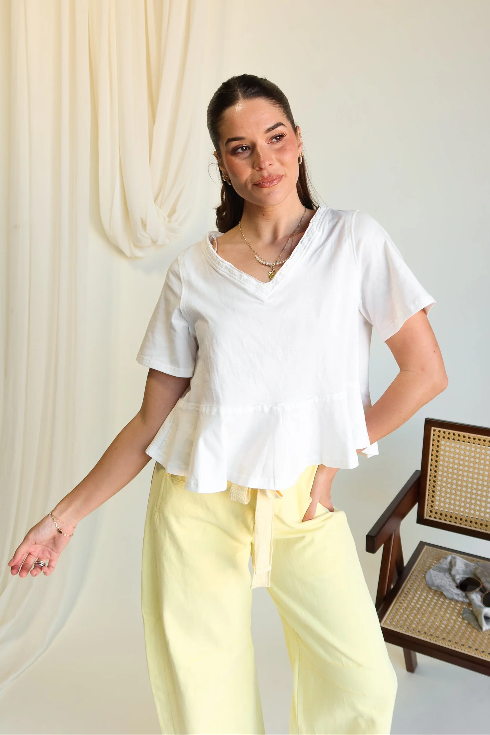 Daisy White V-Neckline Flare Top