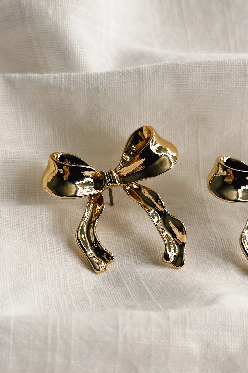 Lois Gold Bow Stud Earrings - Image 2