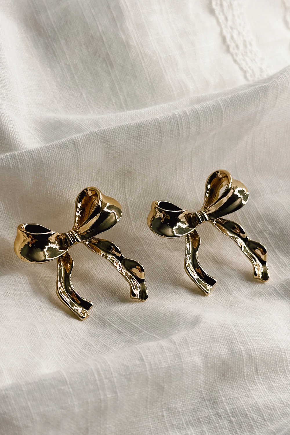 Lois Gold Bow Stud Earrings - Image 3