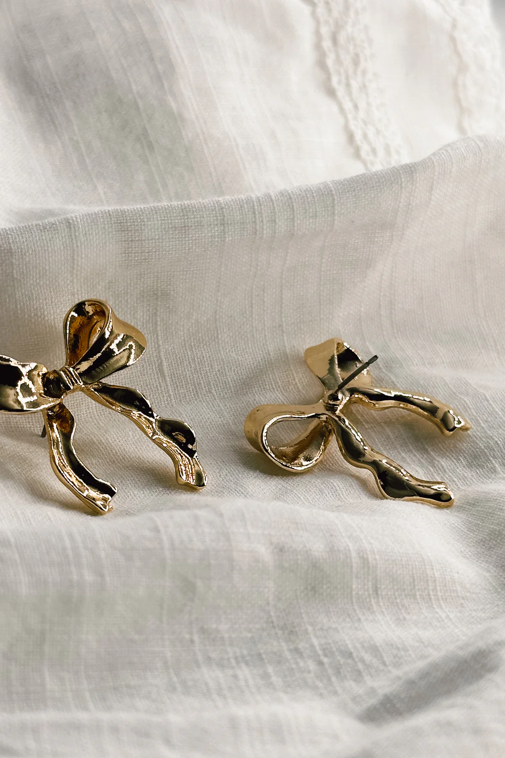Lois Gold Bow Stud Earrings - Image 4
