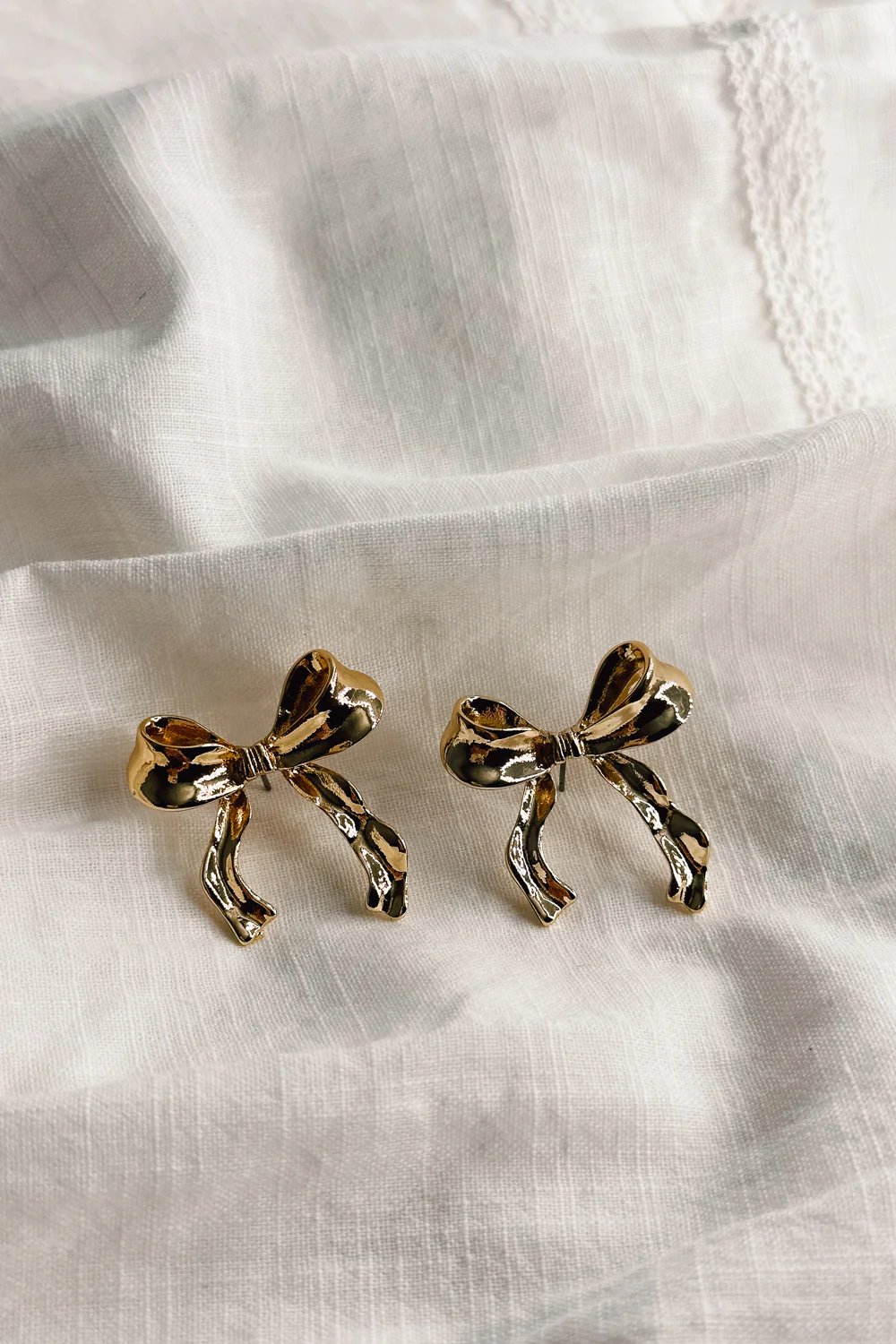Lois Gold Bow Stud Earrings - Image 5